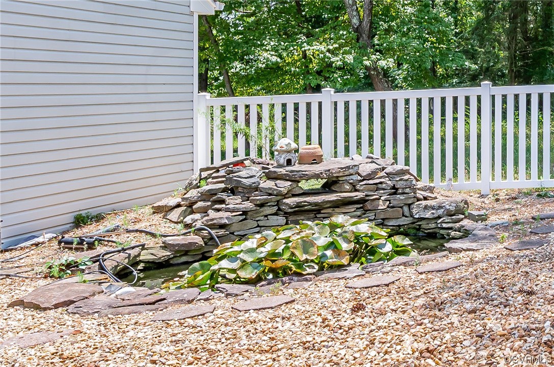 3741 Harrow Drive Chester, VA 23831 - Photo 33 of 37 a side of a house with a bench