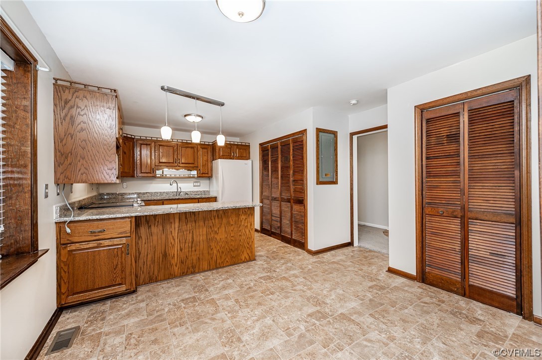 3741 Harrow Drive Chester, VA 23831 - Photo 10 of 37 a large kitchen with cabinets and stainless steel appliances