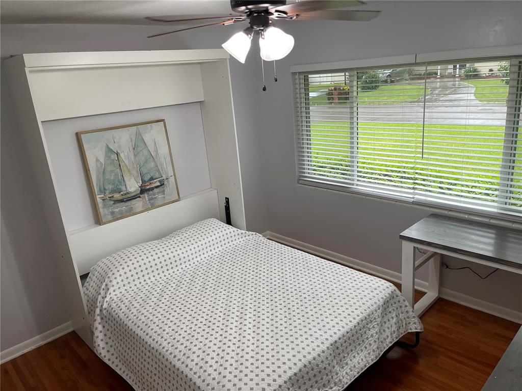 1963 Ripon Drive Clearwater, FL 33764 - Photo 18 of 29 a bedroom with a bed and a window