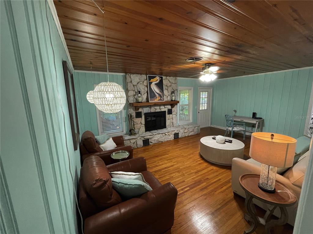 1963 Ripon Drive Clearwater, FL 33764 - Photo 10 of 29 a living room with furniture and a fireplace