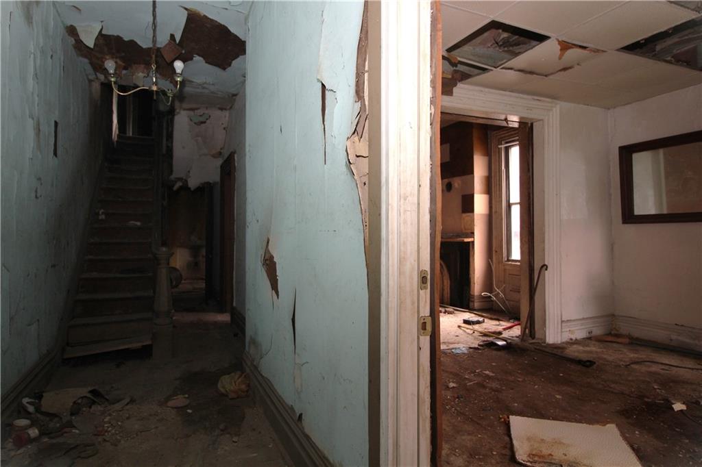 600 Armandale Street Pittsburgh, PA 15212 - Photo 5 of 12 a view of hallway with stairs and wooden floor