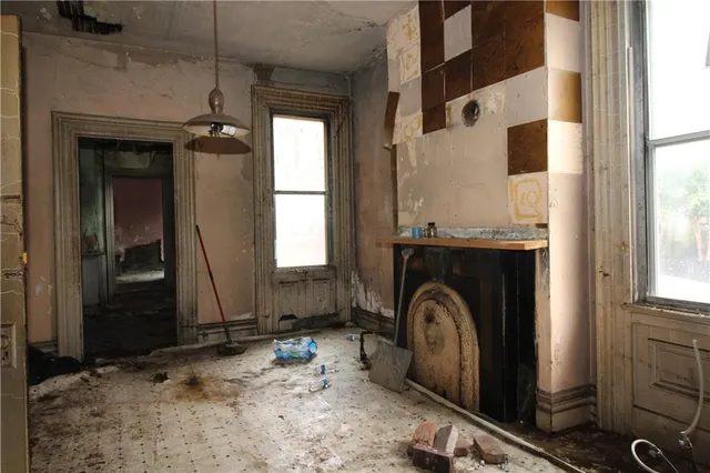 a view of a storage & utility room with a sink