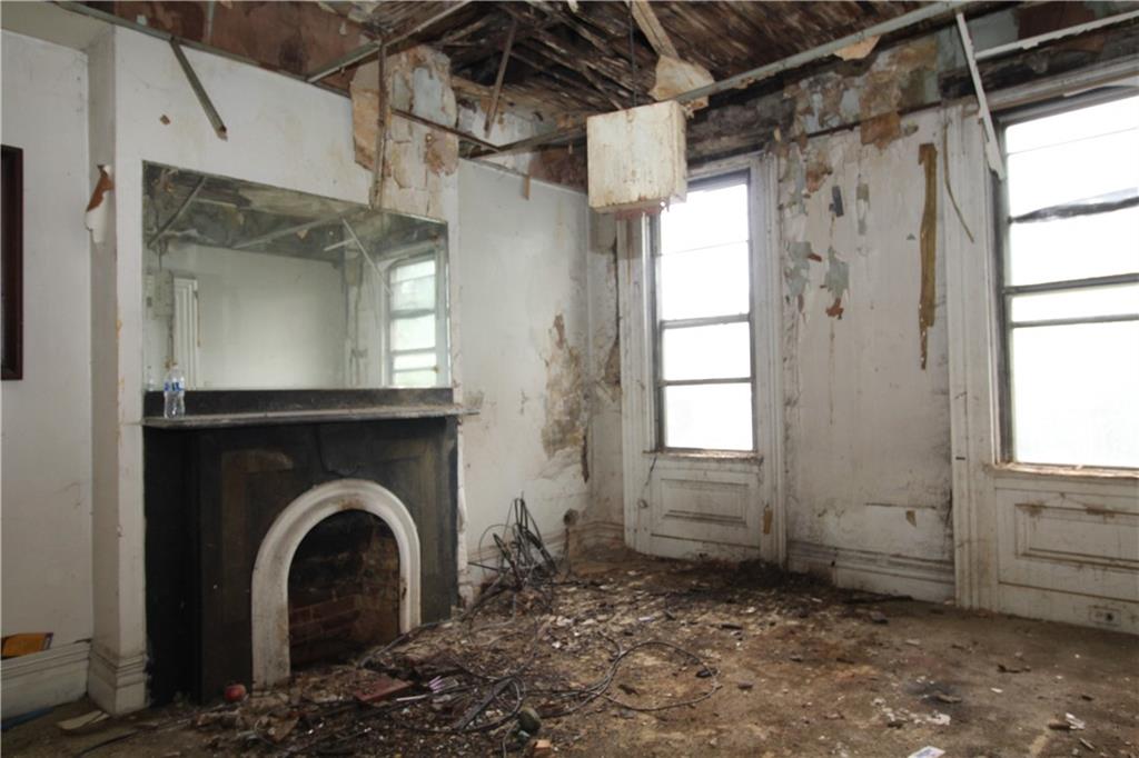 600 Armandale Street Pittsburgh, PA 15212 - Photo 9 of 12 a view of a hallway with a fireplace and a window