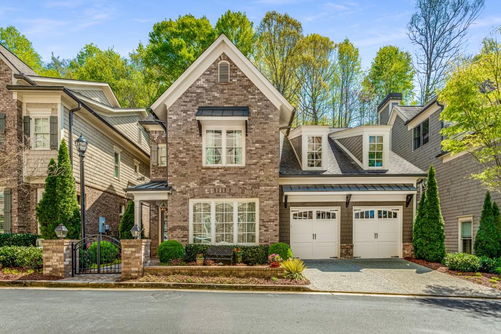309 Riversedge Drive Atlanta, GA 30339 - Photo 1 of 1 front view of a house with a street