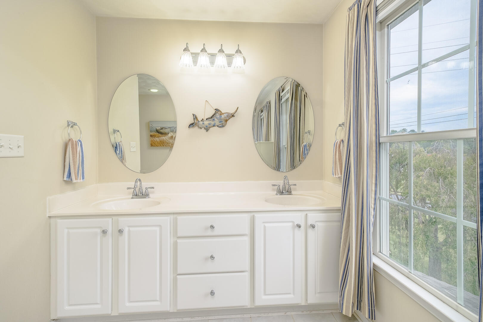 90 Oak Drive Blue Ridge, VA 24064 - Photo 29 of 38 a bathroom with a double vanity sink and a mirror