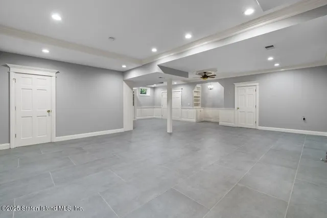 a view of a hallway with a chandelier