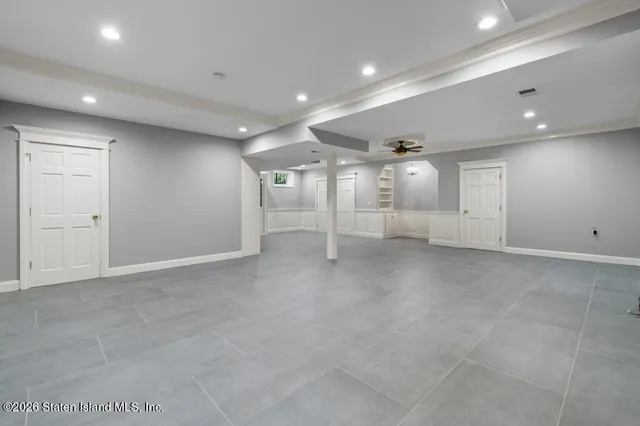 a view of a hallway with a kitchen