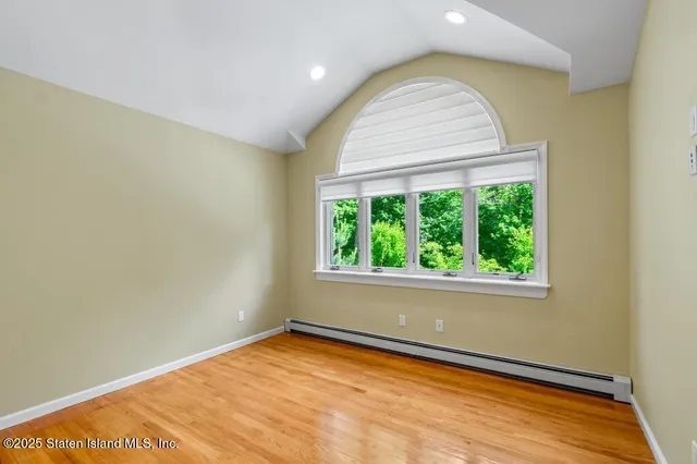a view of a room with a large window