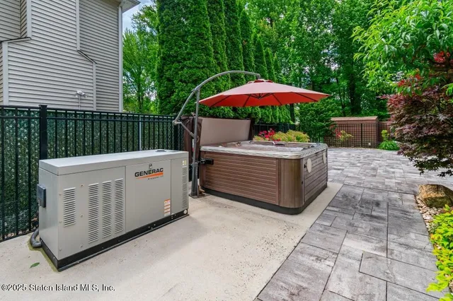a view of a wooden door with a chair and table