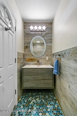 a bathroom with a toilet a sink and a shower