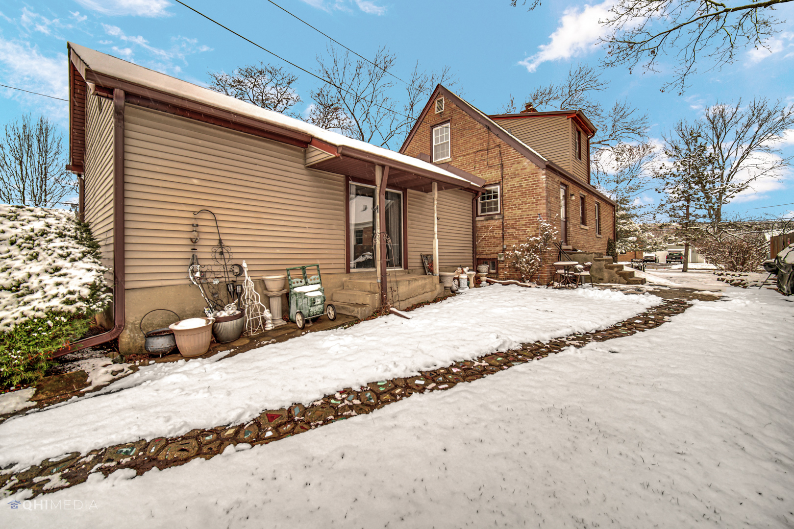 1118 Manchester Road Wheaton, IL 60187 - Photo 5 of 19 a view of a house with snow on the road