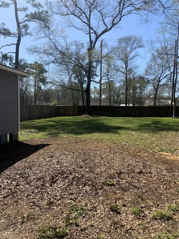 a view of a park and trees