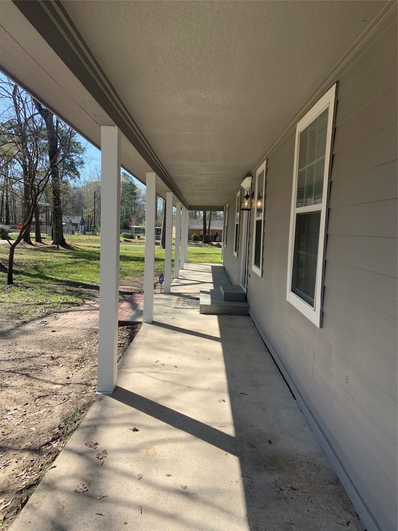 10978 Youpon Street Cleveland, TX 77328 - Photo 3 of 24 a view of porch with seating space