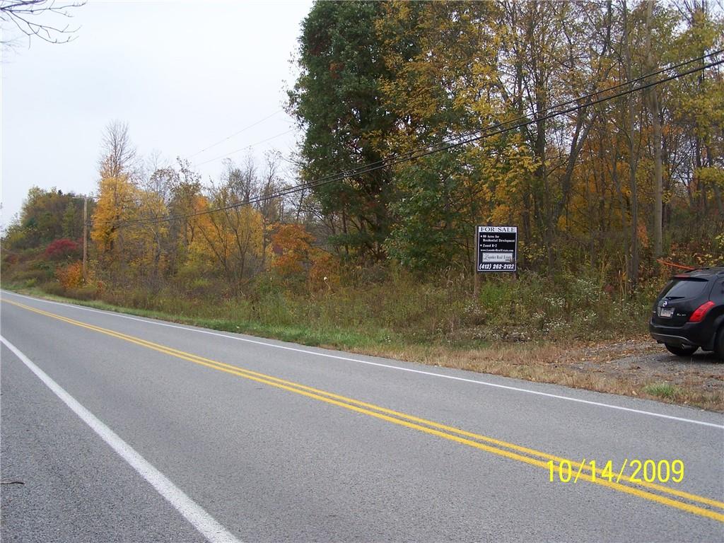 750 North Branch Road McDonald, PA 15057 - Photo 2 of 17 a view of a street with a car parked on the road
