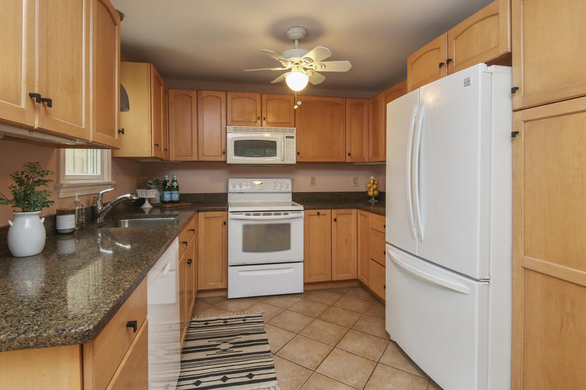 18 Sandy Valley Road Marstons Mills, MA 02648 - Photo 11 of 25 a kitchen with stainless steel appliances granite countertop a refrigerator sink and stove