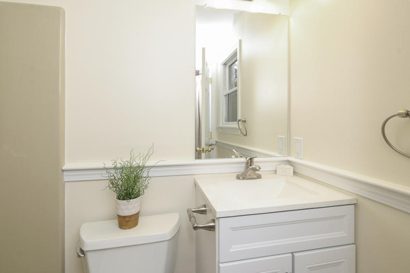 18 Sandy Valley Road Marstons Mills, MA 02648 - Photo 20 of 25 a bathroom with a sink and a mirror