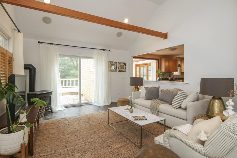 18 Sandy Valley Road Marstons Mills, MA 02648 - Photo 4 of 25 a living room with furniture and a flat screen tv