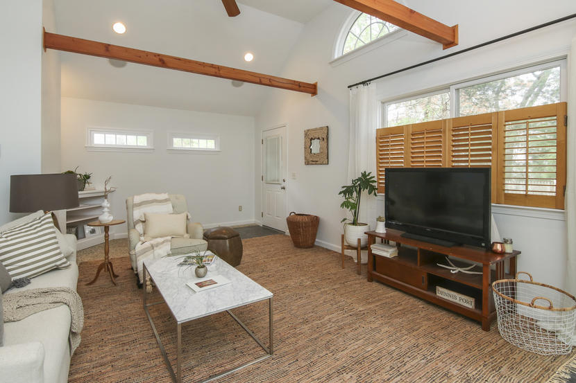 18 Sandy Valley Road Marstons Mills, MA 02648 - Photo 5 of 25 a living room with furniture and a flat screen tv