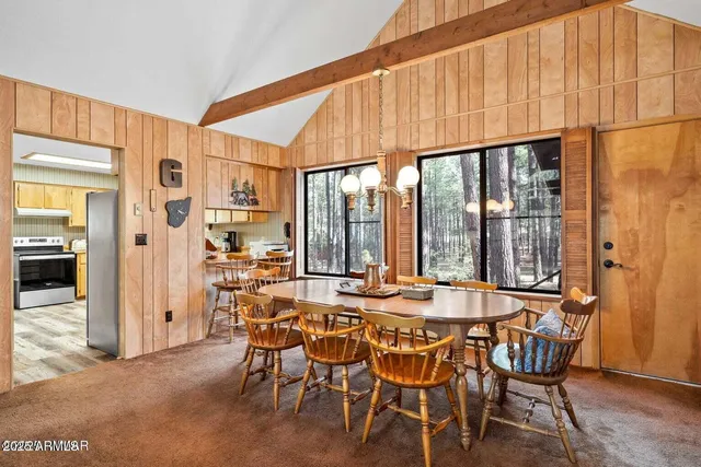 a kitchen with stainless steel appliances a stove sink and cabinets