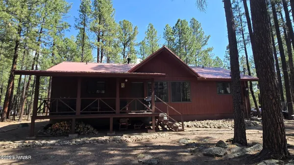 a front view of a house with parking space