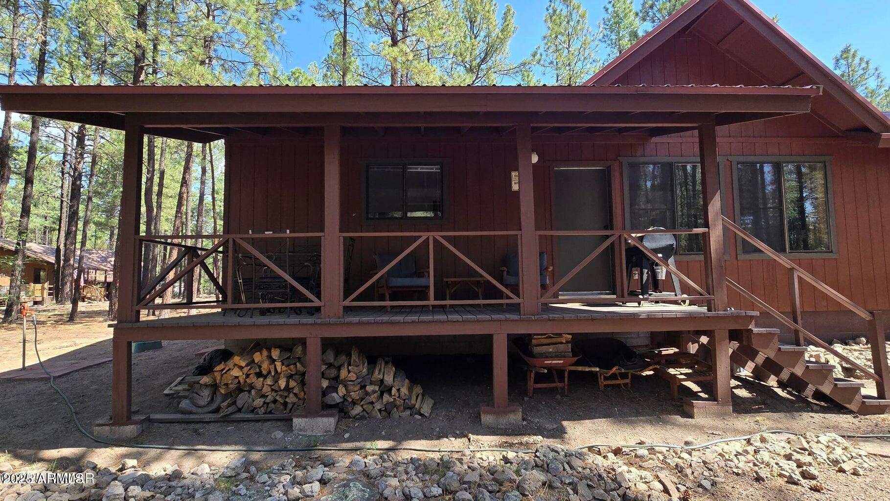4 County Road 2089 Alpine, AZ 85920 - Photo 9 of 48 a view of house with chair and tables