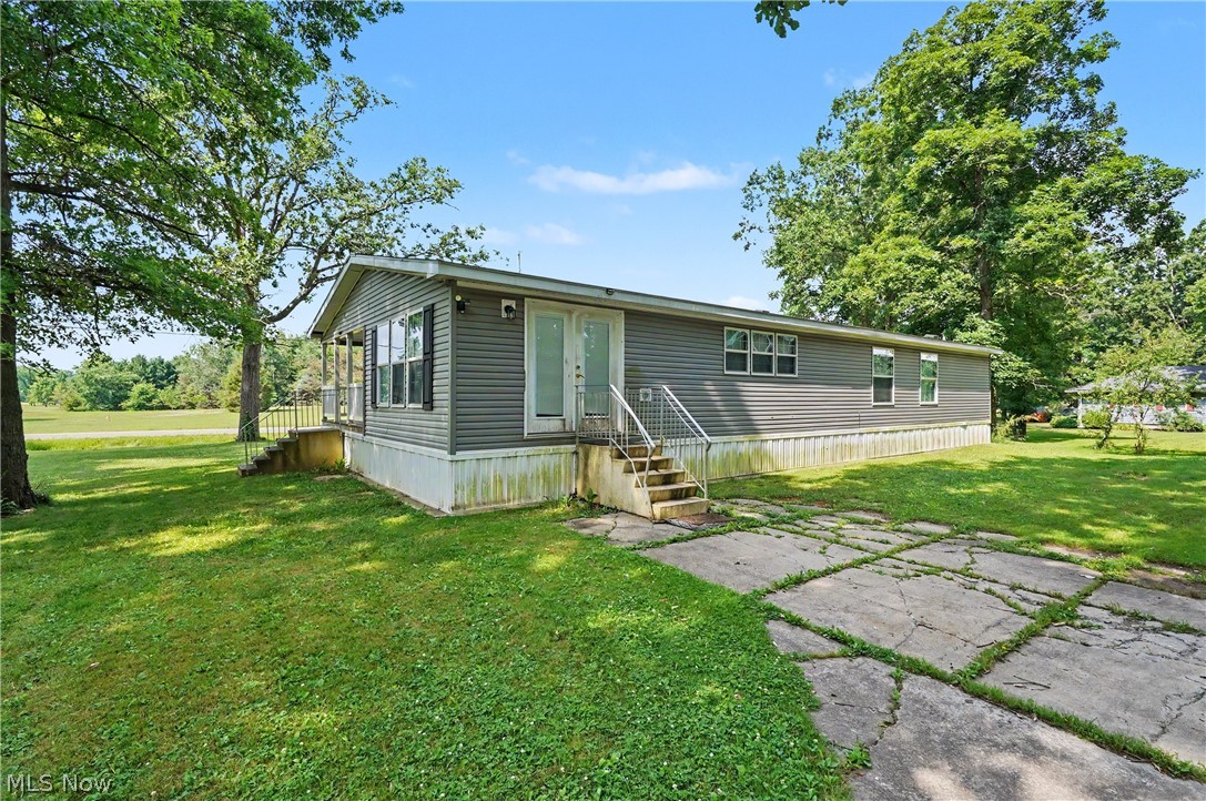 3424 Painesville Warren State Road Southington, OH 44470 - Photo 4 of 50 3424 Painesville Warren Rd, Southington, OH 44470 – Enjoy comfortable one-floor living in this well-maintained home built in 2018. Featuring 3 bedrooms, 2 full bathrooms, and an open-concept layout, this home offers both functionality and convenience. The spacious kitchen, dining, and living areas provide plenty of room for everyday living and entertaining. A large garage offers ample space for vehicles, storage, hobbies, or workshop needs. Situated on a generous lot with a welcoming front porch, this property combines modern living with a peaceful country setting. Move-in ready and waiting for its next owner!