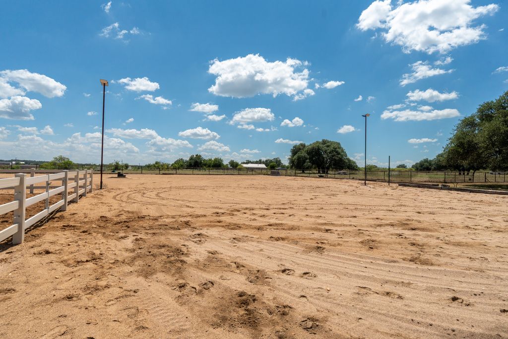 3550 County Road 245 Florence, TX 76527 - Photo 15 of 38 Sand footing inside and outside the Arena offers good traction. Meticulous owners spared no expense. Lights in place add to this Turn Key Equestrian Property.