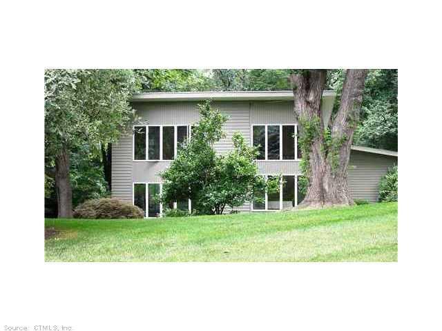 451 Old Cellar Road Orange, CT 06477 - Photo 1 of 1 a view of a house with a yard