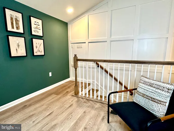 a view of a hallway with staircase