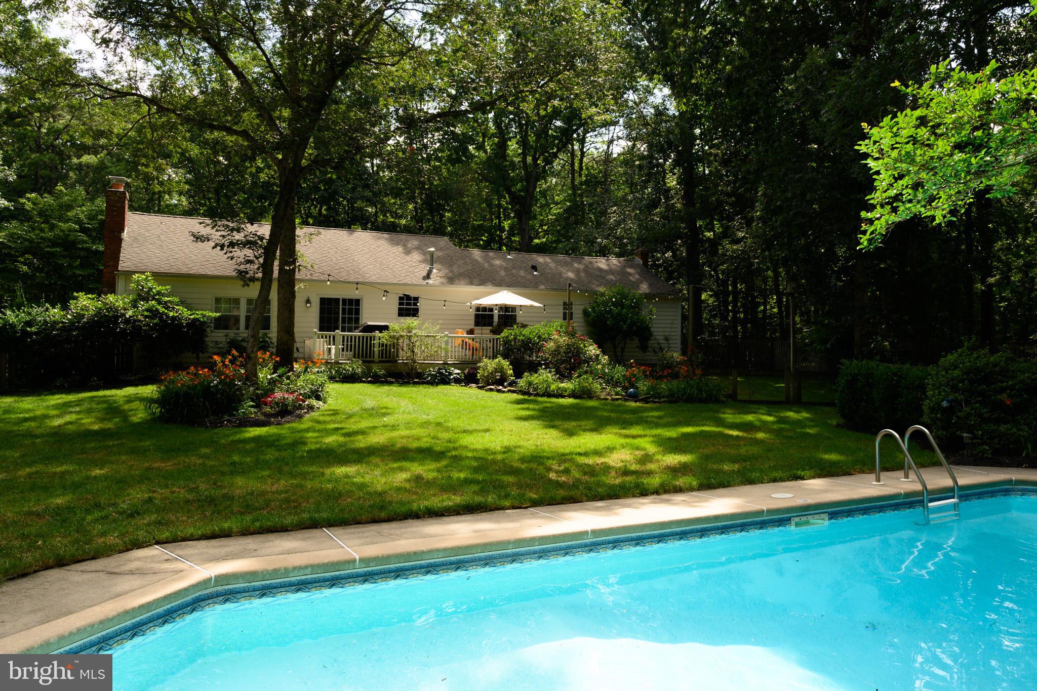 653 McKendimen Road Shamong, NJ 08088 - Photo 11 of 13 a view of backyard of house with green space