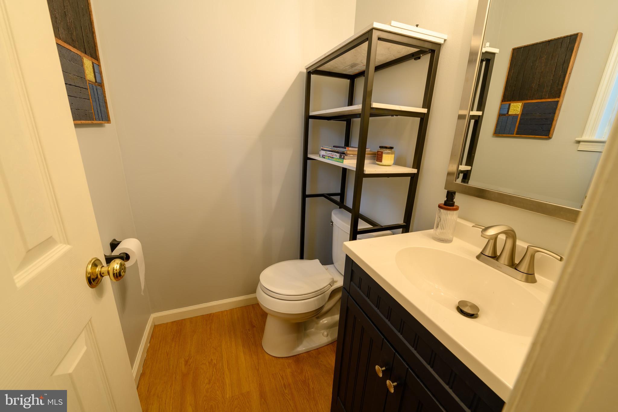 653 McKendimen Road Shamong, NJ 08088 - Photo 6 of 13 a bathroom with a sink toilet and mirror