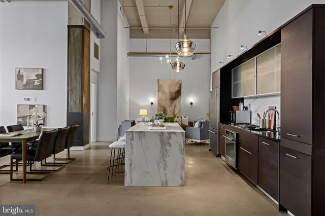 a view of a kitchen and dining room