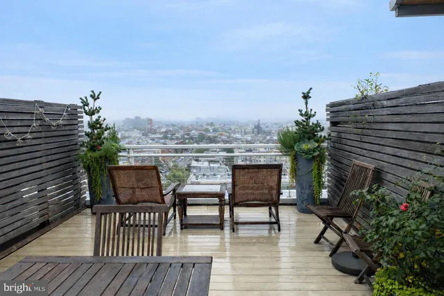 a view of a terrace with furniture