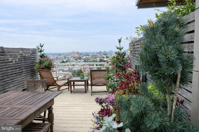 a view of a terrace with sitting area