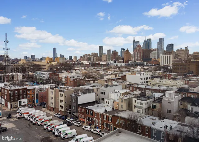 a view of a city with tall buildings