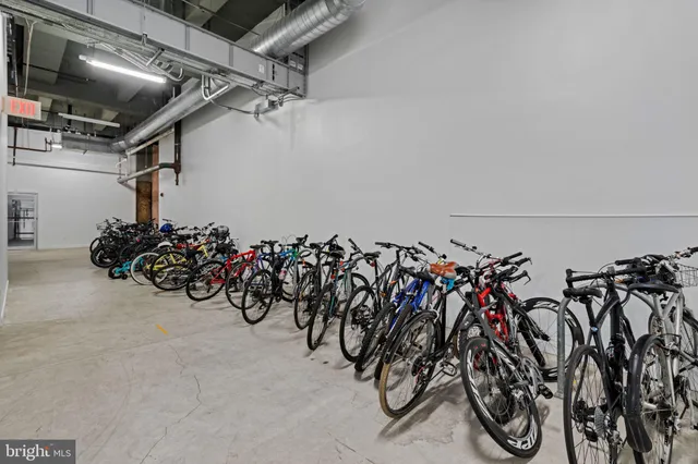 a building with potted plants in front of it
