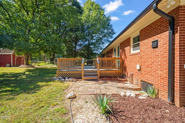 a garden view with a sitting space