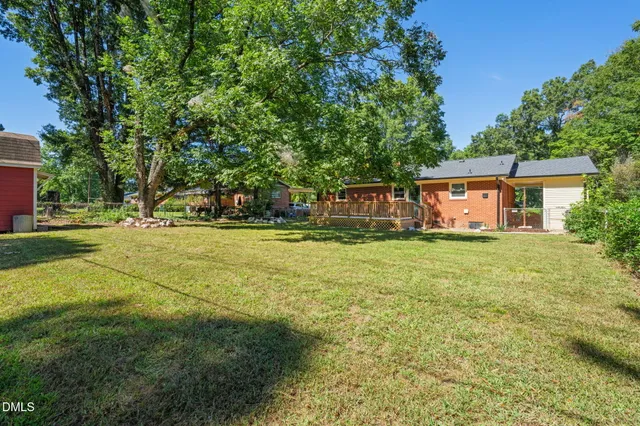 a house view with a garden space