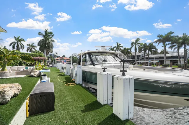 a view of a building with couches in a patio