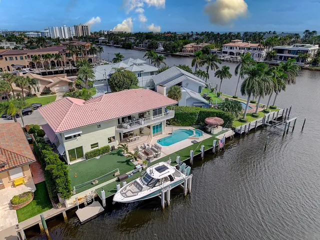 an aerial view of a house with outdoor space