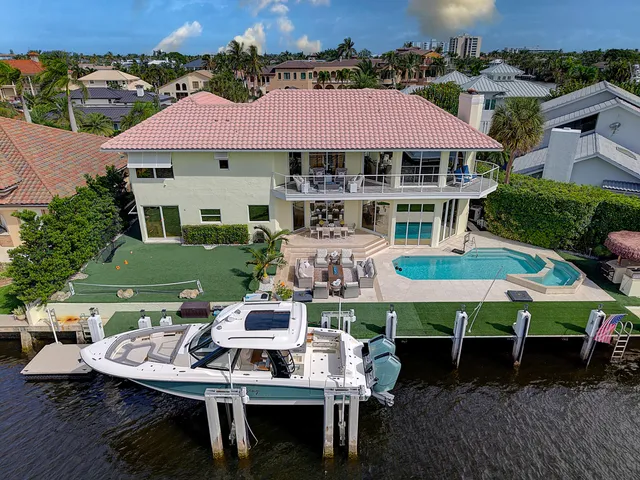 a patio with table and chairs
