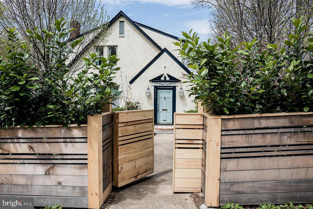 2244 Crest Road Baltimore, MD 21209 - Photo 11 of 54 a view of a house with a yard and large tree