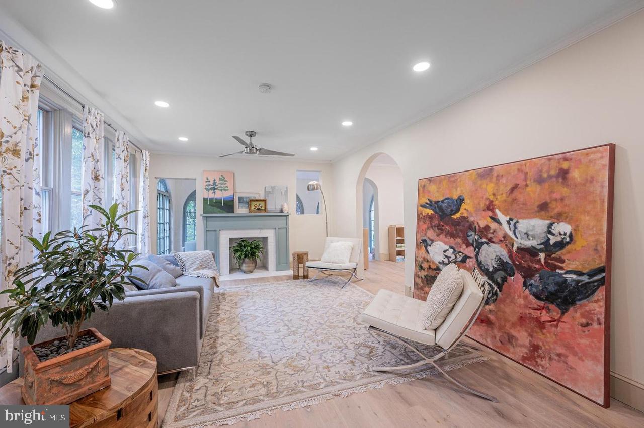 2244 Crest Road Baltimore, MD 21209 - Photo 17 of 54 a living room with furniture and a fireplace