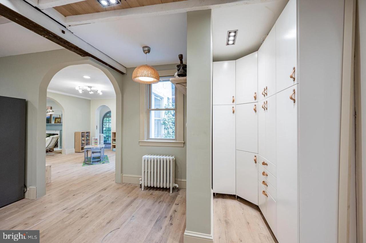 2244 Crest Road Baltimore, MD 21209 - Photo 28 of 54 a view of a hallway view with wooden floor and staircase