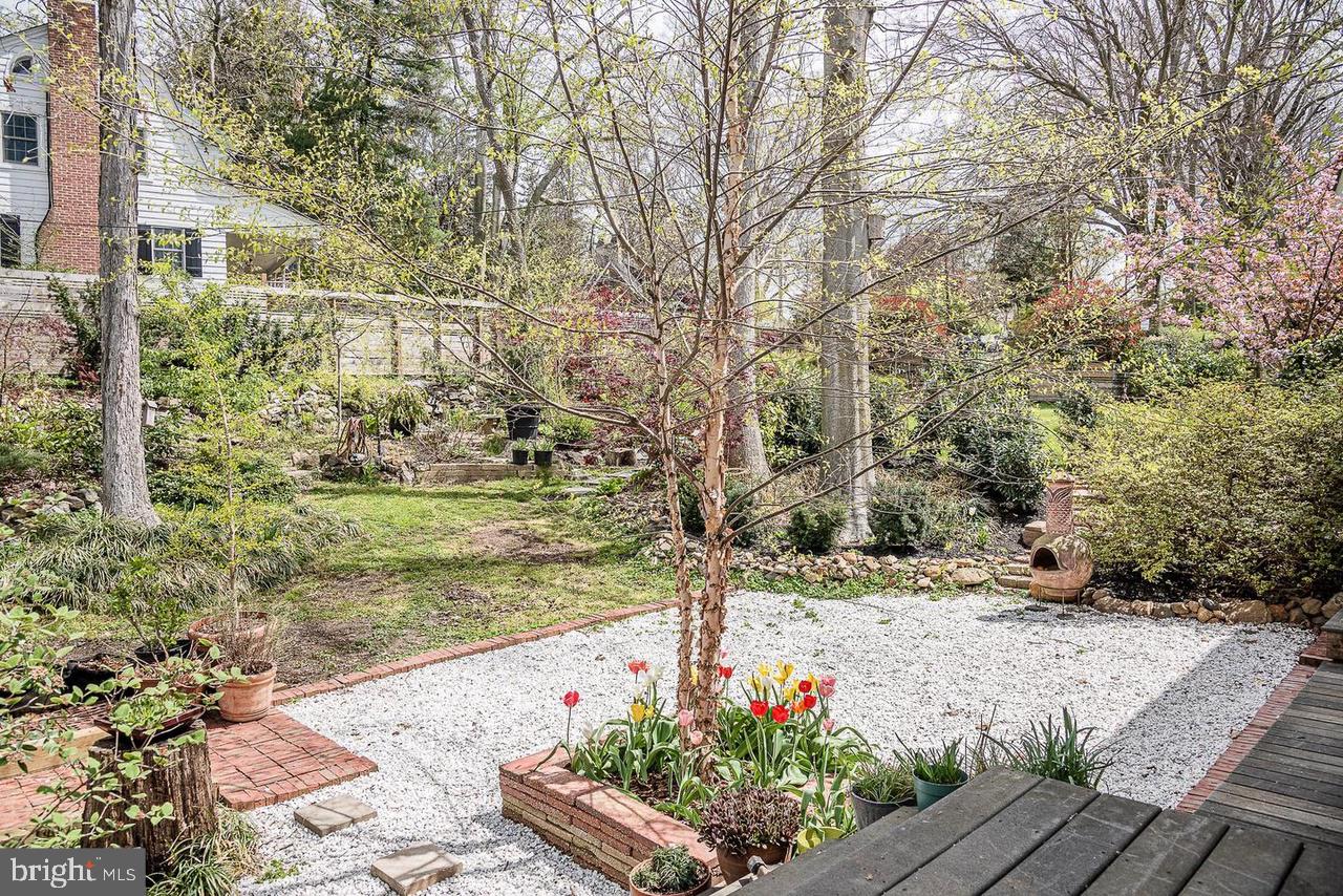 2244 Crest Road Baltimore, MD 21209 - Photo 30 of 54 a view of a pathway with flower garden
