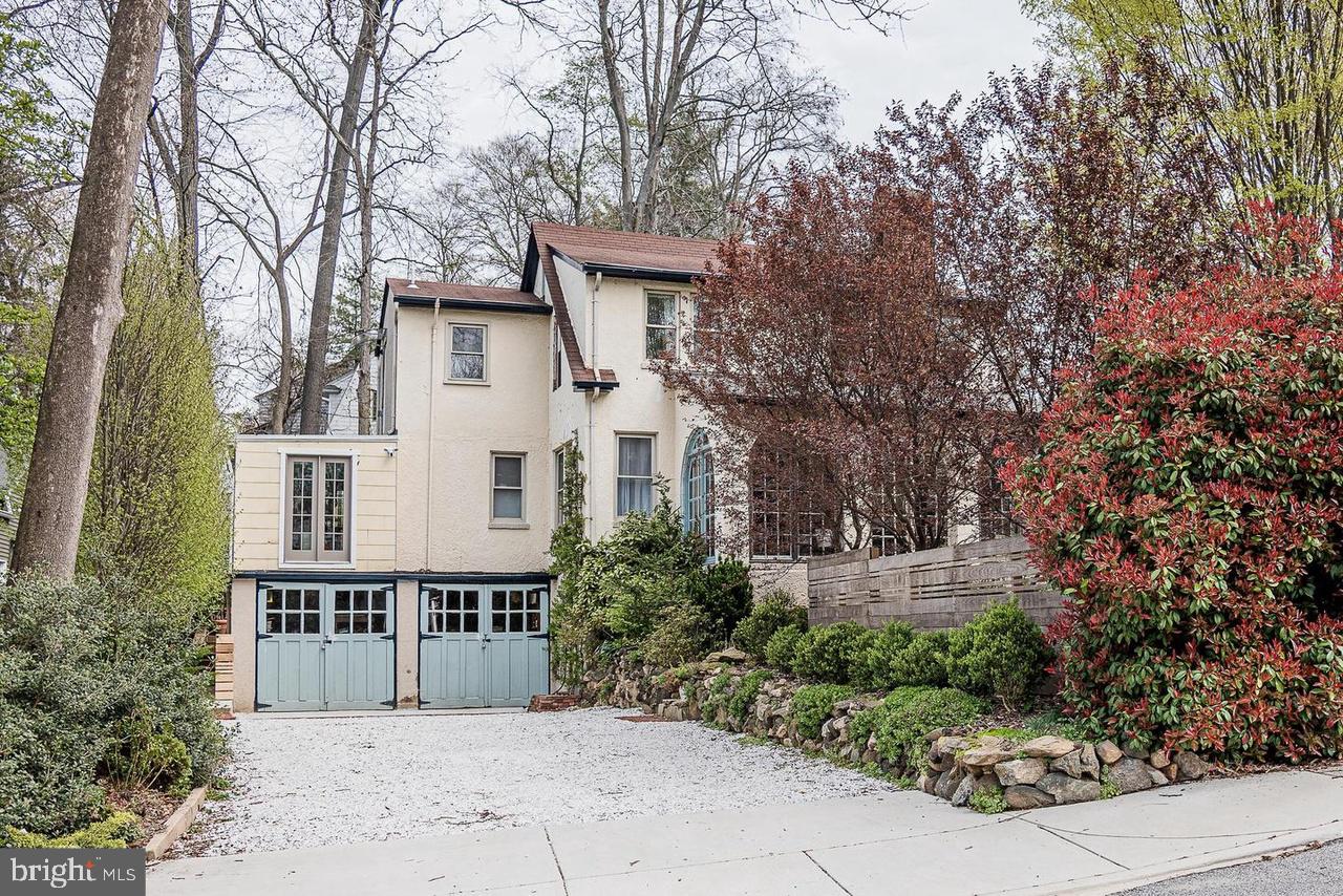 2244 Crest Road Baltimore, MD 21209 - Photo 9 of 54 a front view of a house with a garden