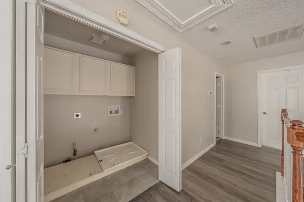 a bathroom with a tub and sink