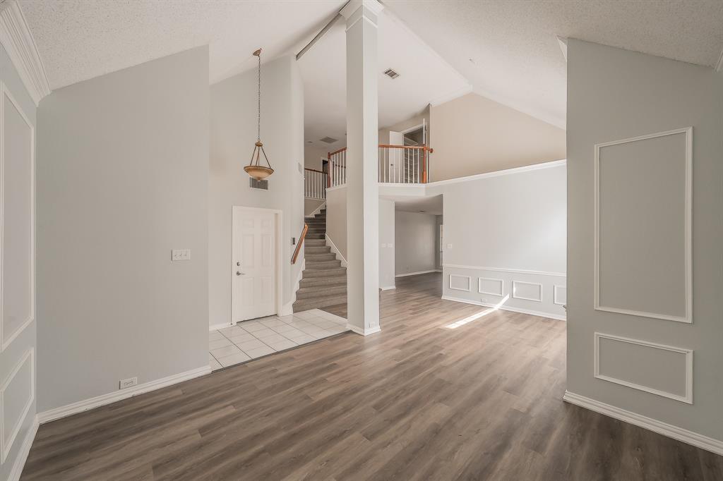 2643 Garden Ridge Lane Arlington, TX 76006 - Photo 3 of 40 an empty room with wooden floor
