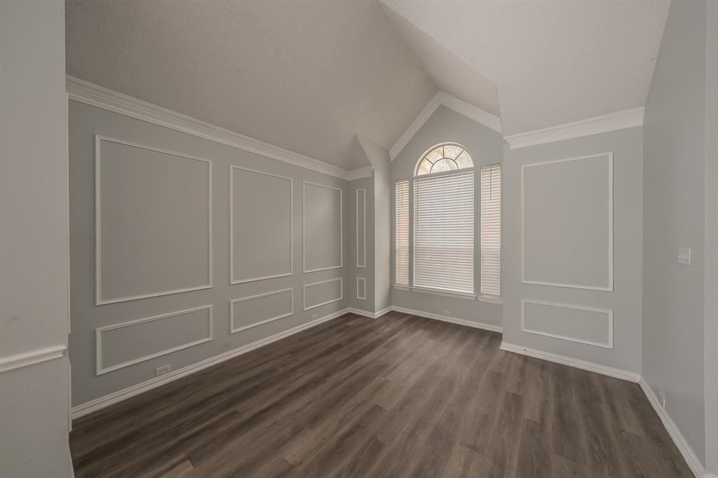 2643 Garden Ridge Lane Arlington, TX 76006 - Photo 5 of 40 a view of empty room with wooden floor and window