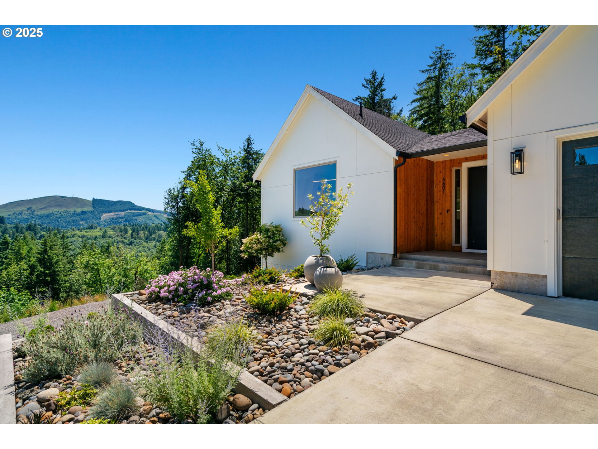 5601 Lewis River Road Ariel, WA 98603 - Photo 4 of 48 a front view of house with yard